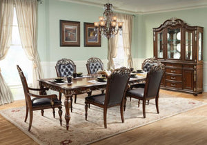 Large scaled and grandiloquent dining room set in traditional mahogany color.